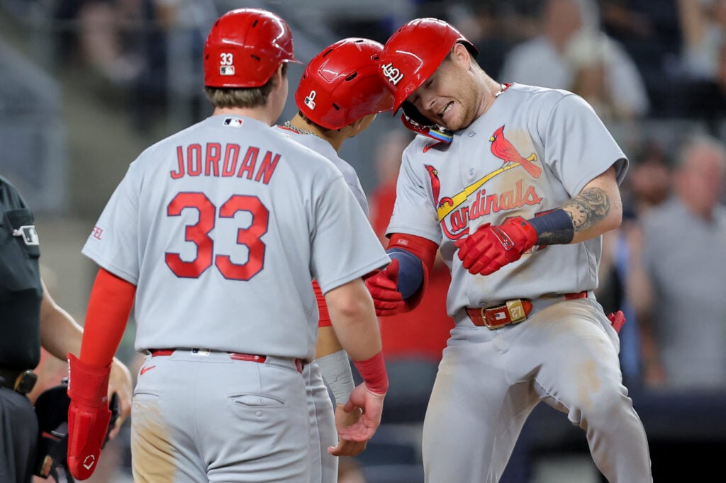 Aug 3, 2026; Bronx, New York, USA; St. Louis Cardinals center fielder Nathan Church (27) celebrates his go ahead three run home run against the New York Yankees with shortstop Masyn Winn (0) and third baseman Blaze Jordan (33) during the eighth inning at Yankee Stadium. Mandatory Credit: Brad Penner-Imagn Images