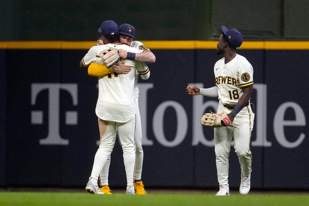 Aug 4, 2026; Milwaukee, Wisconsin, USA; Milwaukee Brewers outfielder Jackson Chourio (11), outfielder Garrett Mitchell (5) and outfielder Luis Lara (18) celebrate a win over the Pittsburgh Pirates at American Family Field. Mandatory Credit: Michael McLoone-Imagn Images