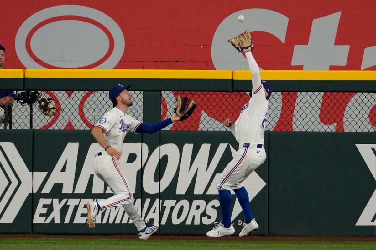 Aug 5, 2026; Arlington, Texas, USA; Texas Rangers right fielder Brandon Nimmo (24) catches the fly-out hit by San Francisco Giants shortstop Willy Adames (not shown) in front of center fielder Evan Carter (32) during the eighth inning at Globe Life Field. Mandatory Credit: Jim Cowsert-Imagn Images