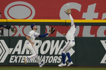 Aug 5, 2026; Arlington, Texas, USA; Texas Rangers right fielder Brandon Nimmo (24) catches the fly-out hit by San Francisco Giants shortstop Willy Adames (not shown) in front of center fielder Evan Carter (32) during the eighth inning at Globe Life Field. Mandatory Credit: Jim Cowsert-Imagn Images