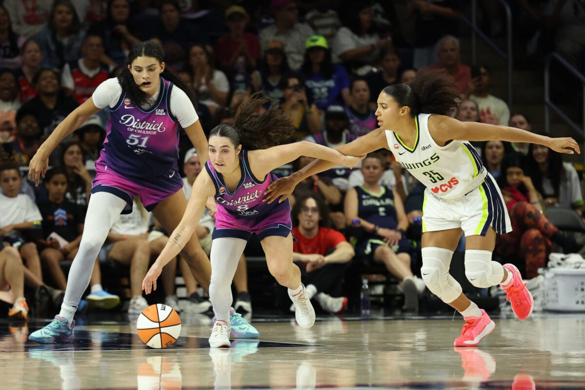 Aug 5, 2026; Washington, District of Columbia, USA; Washington Mystics guard Georgia Amoore (8) steals th ball from Dallas Wings guard Azzi Fudd (35) in the second half at CareFirst Arena. Mandatory Credit: Geoff Burke-Imagn Images