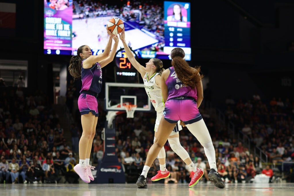 Aug 5, 2026; Washington, District of Columbia, USA; Washington Mystics guard Sonia Citron (22) shoots the ball as Dallas Wings guard Paige Bueckers (5) defends in the second half at CareFirst Arena. Mandatory Credit: Geoff Burke-Imagn Images