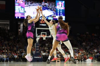 Aug 5, 2026; Washington, District of Columbia, USA; Washington Mystics guard Sonia Citron (22) shoots the ball as Dallas Wings guard Paige Bueckers (5) defends in the second half at CareFirst Arena. Mandatory Credit: Geoff Burke-Imagn Images