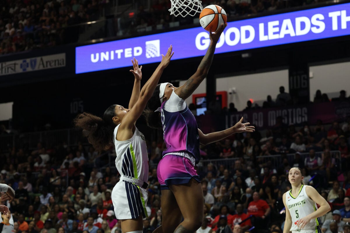 Aug 5, 2026; Washington, District of Columbia, USA; Washington Mystics forward Kiki Iriafen (44) shoots the ball as Dallas Wings guard Azzi Fudd (35) defends in the second half at CareFirst Arena. Mandatory Credit: Geoff Burke-Imagn Images