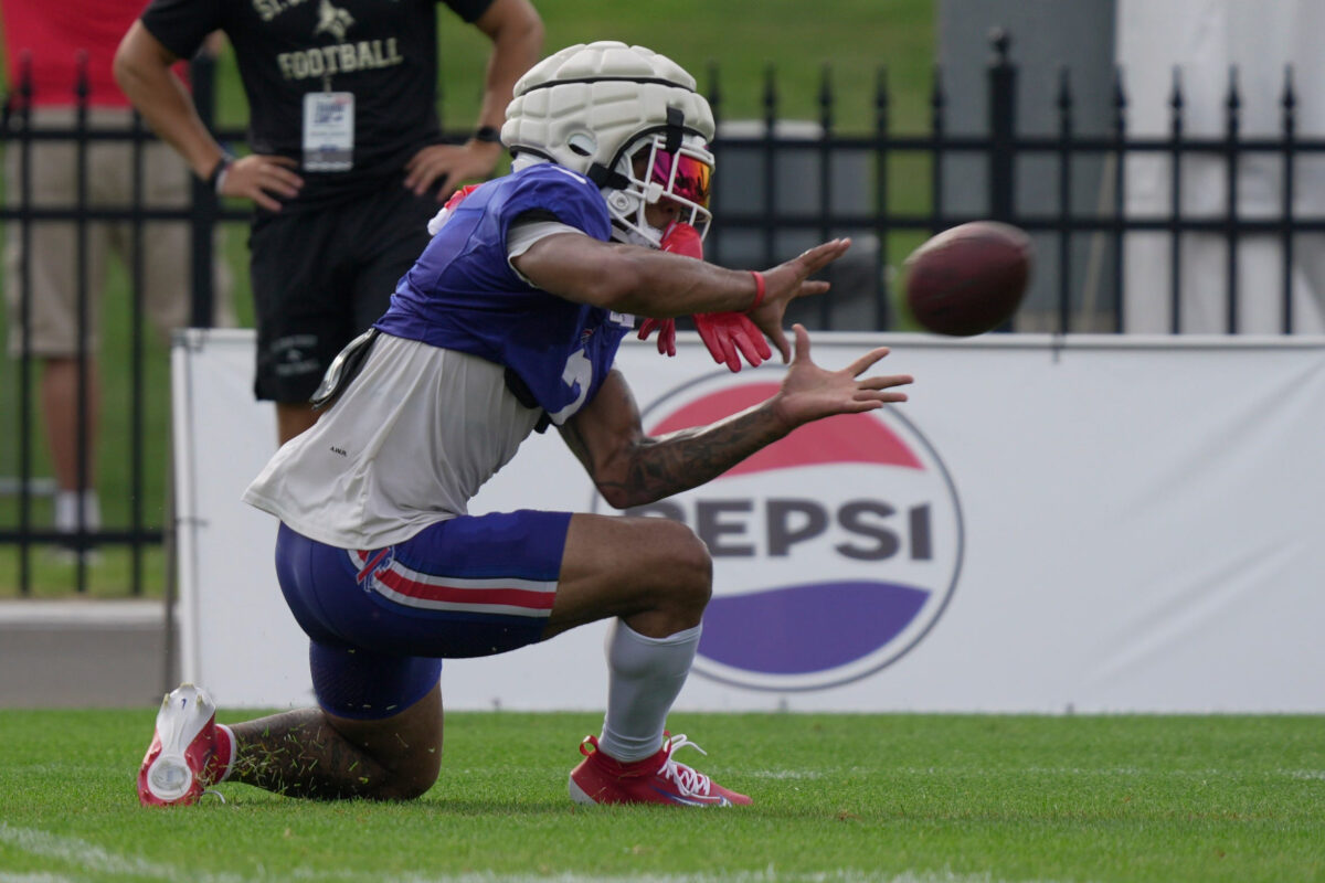 Bills DJ Moore, after slipping on the turf, gets up and makes the catch at Buffalo Bills Training Camp at St. John Fisher University in Pittsford on Aug. 6, 2026.