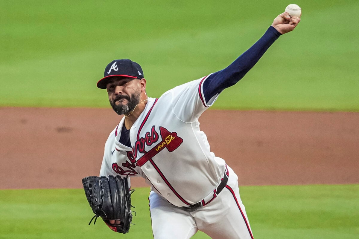 Aug 6, 2026; Cumberland, Georgia, USA; Atlanta Braves pitcher Martin Perez (33) pitches against the Miami Marlins during the first inning at Truist Park. Mandatory Credit: Dale Zanine-Imagn Images