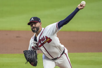 Aug 6, 2026; Cumberland, Georgia, USA; Atlanta Braves pitcher Martin Perez (33) pitches against the Miami Marlins during the first inning at Truist Park. Mandatory Credit: Dale Zanine-Imagn Images