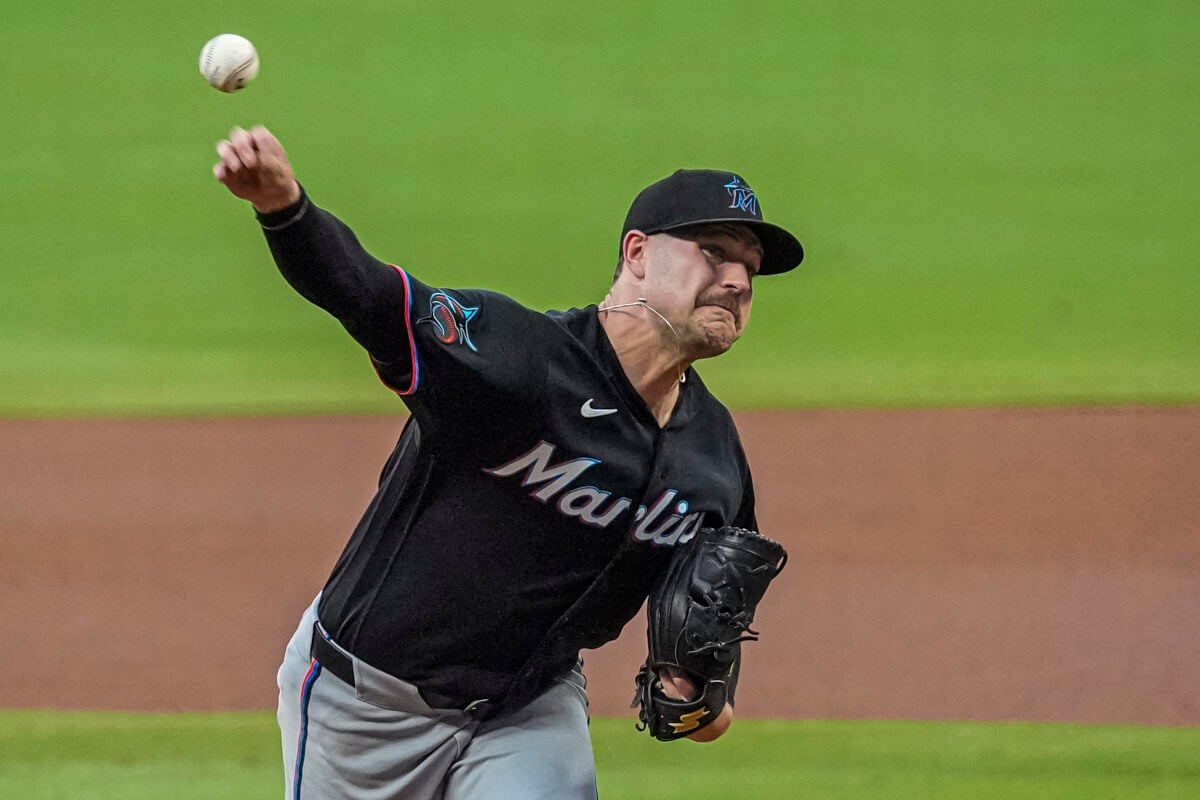 Aug 6, 2026; Cumberland, Georgia, USA; Miami Marlins pitcher Janson Junk (26) pitches against the Atlanta Braves during the first inning at Truist Park. Mandatory Credit: Dale Zanine-Imagn Images