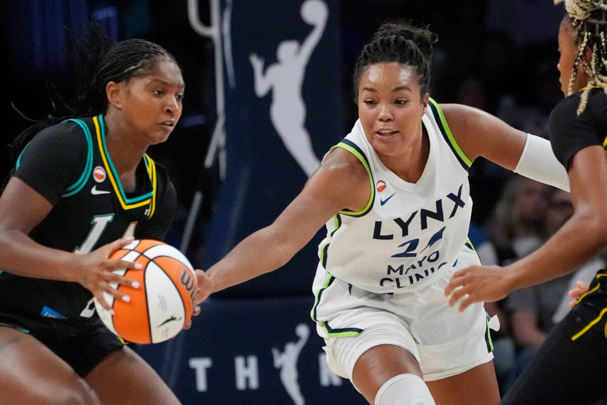 Aug 6, 2026; Minneapolis, Minnesota, USA; Minnesota Lynx forward Napheesa Collier (24) vies for the ball against Los Angeles Sparks guard Chance Gray (2) in the third quarter at Target Center. Mandatory Credit: Bruce Kluckhohn-Imagn Images