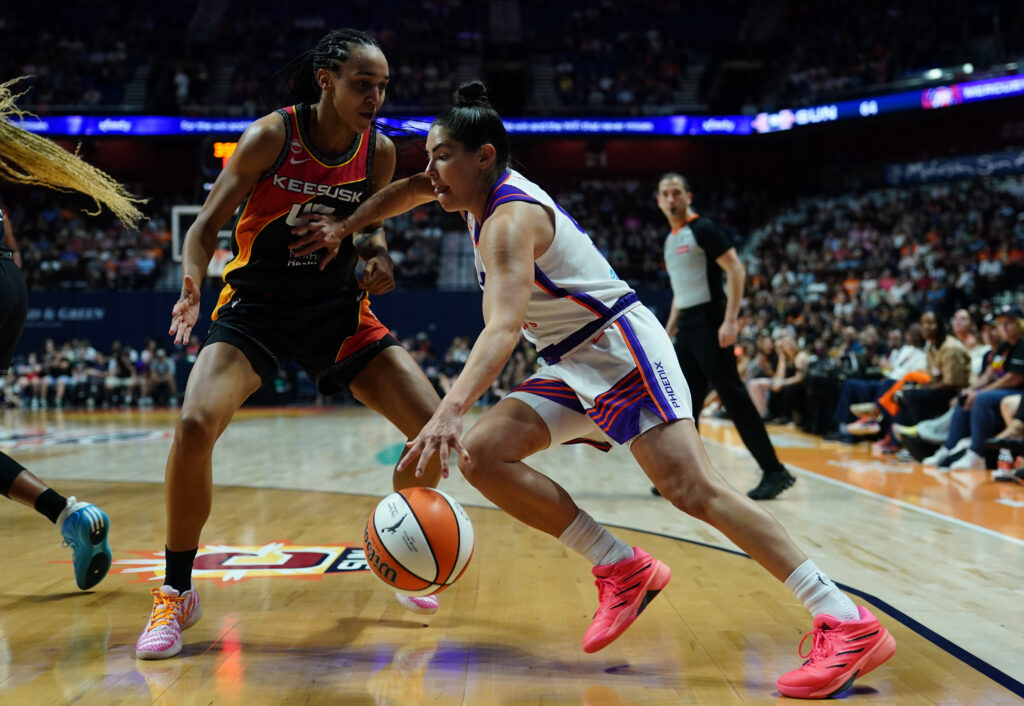 Aug 7, 2026; Uncasville, Connecticut, USA; Phoenix Mercury guard Kelsey Plum (0) drives the ball against Connecticut Sun guard Leila Lacan (47) in the second half at Mohegan Sun Arena. Mandatory Credit: David Butler II-Imagn Images
