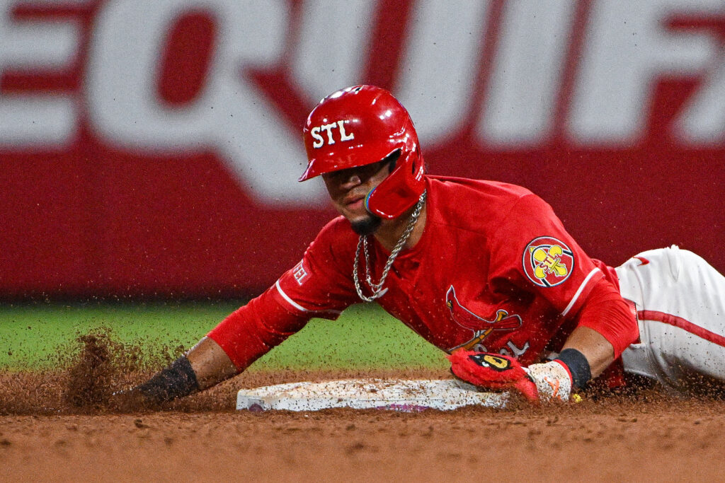Aug 7, 2026; St. Louis, Missouri, USA; St. Louis Cardinals shortstop Masyn Winn (0) slides in head first as he steals second base during the sixth inning at Busch Stadium. Mandatory Credit: Jeff Curry-Imagn Images