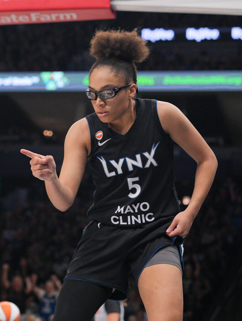 Aug 8, 2026; Minneapolis, Minnesota, USA; Minnesota Lynx forward Olivia Miles (5) celebrate her basket against the Las Vegas Aces in the fourth quarter at Target Center. Mandatory Credit: Brad Rempel-Imagn Images