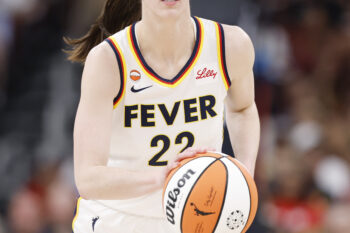 Aug 8, 2026; Chicago, Illinois, USA; Indiana Fever guard Caitlin Clark (22) brings the ball up court against the Chicago Sky during the first half at United Center. Mandatory Credit: Kamil Krzaczynski-Imagn Images