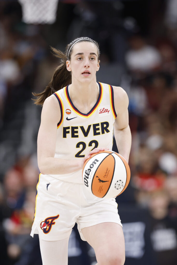 Aug 8, 2026; Chicago, Illinois, USA; Indiana Fever guard Caitlin Clark (22) brings the ball up court against the Chicago Sky during the first half at United Center. Mandatory Credit: Kamil Krzaczynski-Imagn Images
