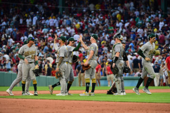 Aug 8, 2026; Boston, Massachusetts, USA;  The Athletics celebrate after defeating the Boston Red Sox at Fenway Park. Mandatory Credit: Bob DeChiara-Imagn Images