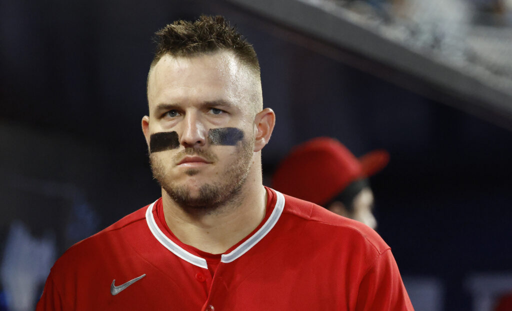 Aug 8, 2026; Miami, Florida, USA;  Los Angeles Angels right fielder Mike Trout (27) stands in the dugout against the Miami Marlins during the fourth inning at loanDepot Park. Mandatory Credit: Rhona Wise-Imagn Images