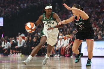 Aug 8, 2026; Portland, Oregon, USA;  Seattle Storm guard Flau'jae Johnson (4) drives to the basket against Portland Fire guard Carla Leite (0) during the first half at Moda Center. Mandatory Credit: Jaime Valdez-Imagn Images