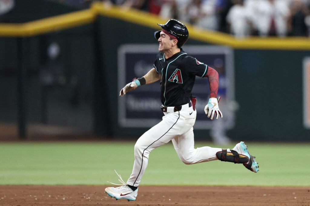 Aug 8, 2026; Phoenix, Arizona, USA; Arizona Diamondbacks right fielder Corbin Carroll (7) runs after hitting an RBI triple against the Los Angeles Dodgers in the ninth inning at Chase Field. Mandatory Credit: Anna Carrington-Imagn Images