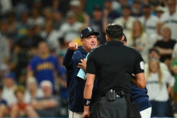 Aug 8, 2026; Seattle, Washington, USA; Seattle Mariners manager Dan Wilson (6) interacts with home plate umpire umpire Emil Jimenez (82) after being ejected during the sixth inning against the Tampa Bay Rays at T-Mobile Park. Mandatory Credit: Steven Bisig-Imagn Images