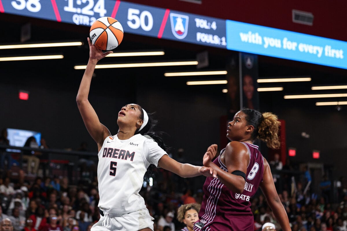 Aug 10, 2026; College Park, Georgia, USA; Atlanta Dream forward Angel Reese (5) shoots against Toronto Tempo forward Nyara Sabally (8) in the second quarter at Gateway Center Arena at College Park. Mandatory Credit: Colin Hubbard-Imagn Images