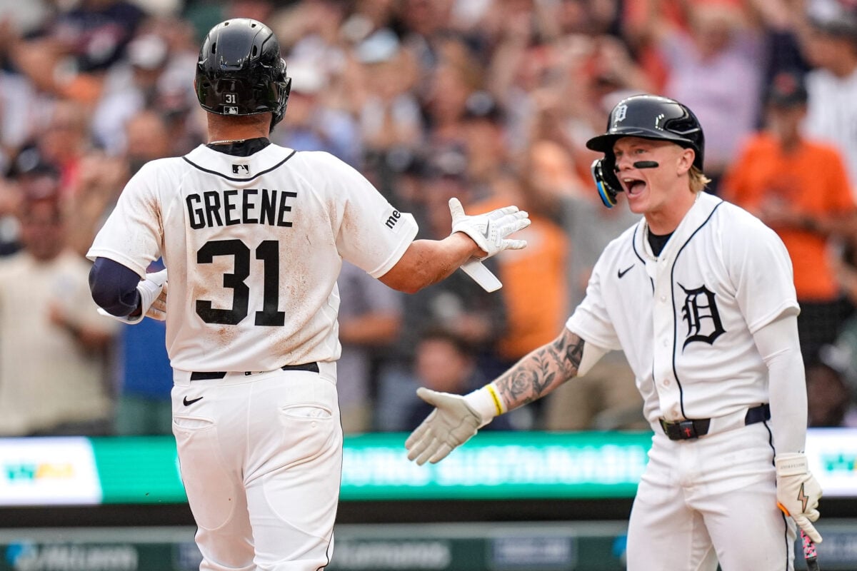Detroit Tigers left fielder Riley Greene (31) high-fives center fielder Max Clark (15) after scoring a run against Cleveland Guardians during the second inning at Comerica Park in Detroit on Tuesday, August 11, 2026.