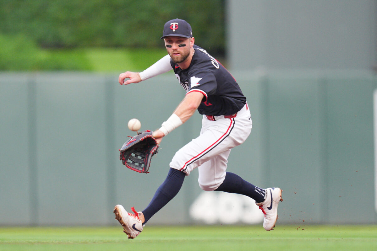 Aug 11, 2026; Minneapolis, Minnesota, USA; Minnesota Twins second baseman Kody Clemens (2) fields a ground ball against the Baltimore Orioles in the second inning at Target Field. Mandatory Credit: Brad Rempel-Imagn Images