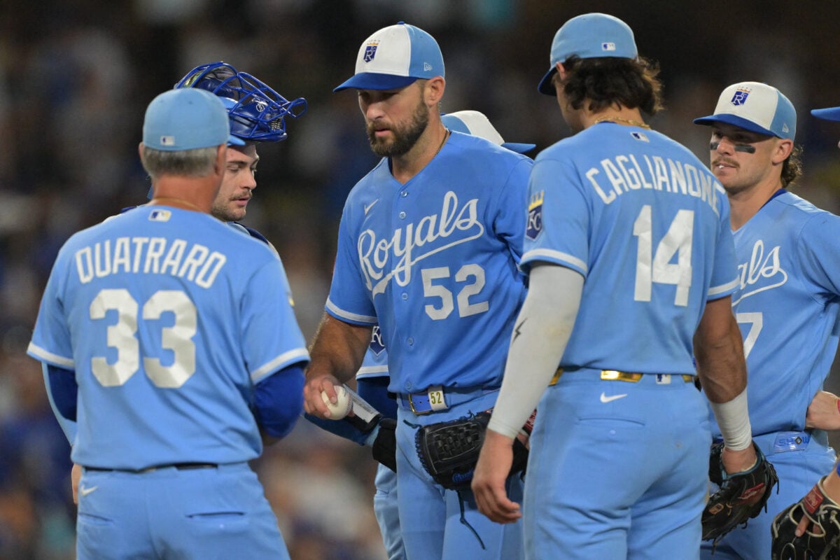 Aug 11, 2026; Los Angeles, California, USA; Kansas City Royals starting pitcher Michael Wacha (52) is pulled by manager Matt Quatraro (33) in the seventh inning against the Los Angeles Dodgers at Dodger Stadium. Mandatory Credit: Jayne Kamin-Oncea-Imagn Images