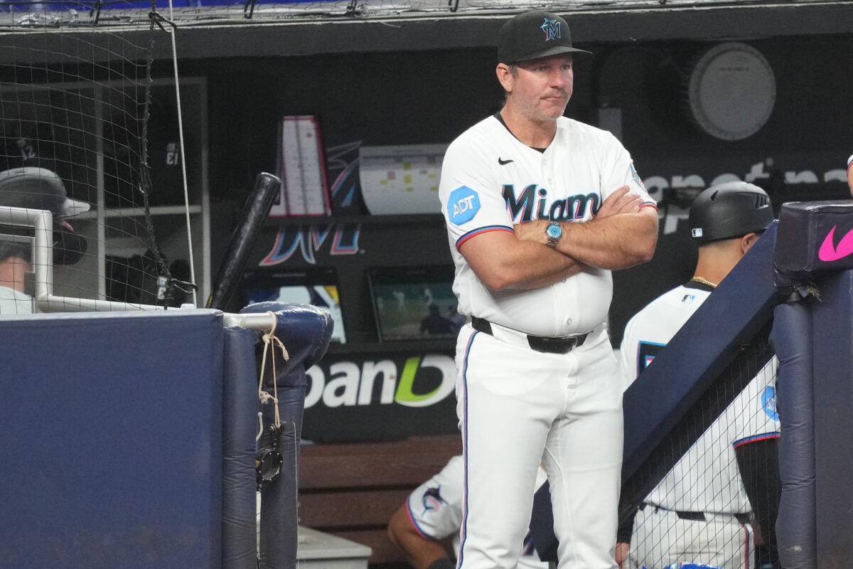 Aug 13, 2026; Miami, Florida, USA;  Miami Marlins manager Clayton McCullough (86) looks on from the dugout in the fourth inning against the Pittsburgh Pirates at loanDepot Park. Mandatory Credit: Jim Rassol-Imagn Images