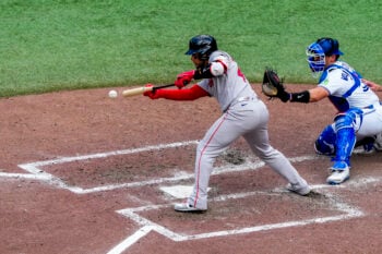 Aug 13, 2026; Toronto, Ontario, CAN;  Boston Red Sox first baseman Willson Contreras (40) bunts against the Toronto Blue Jays during the eighth inning at Rogers Centre. Mandatory Credit: Kevin Sousa-Imagn Images