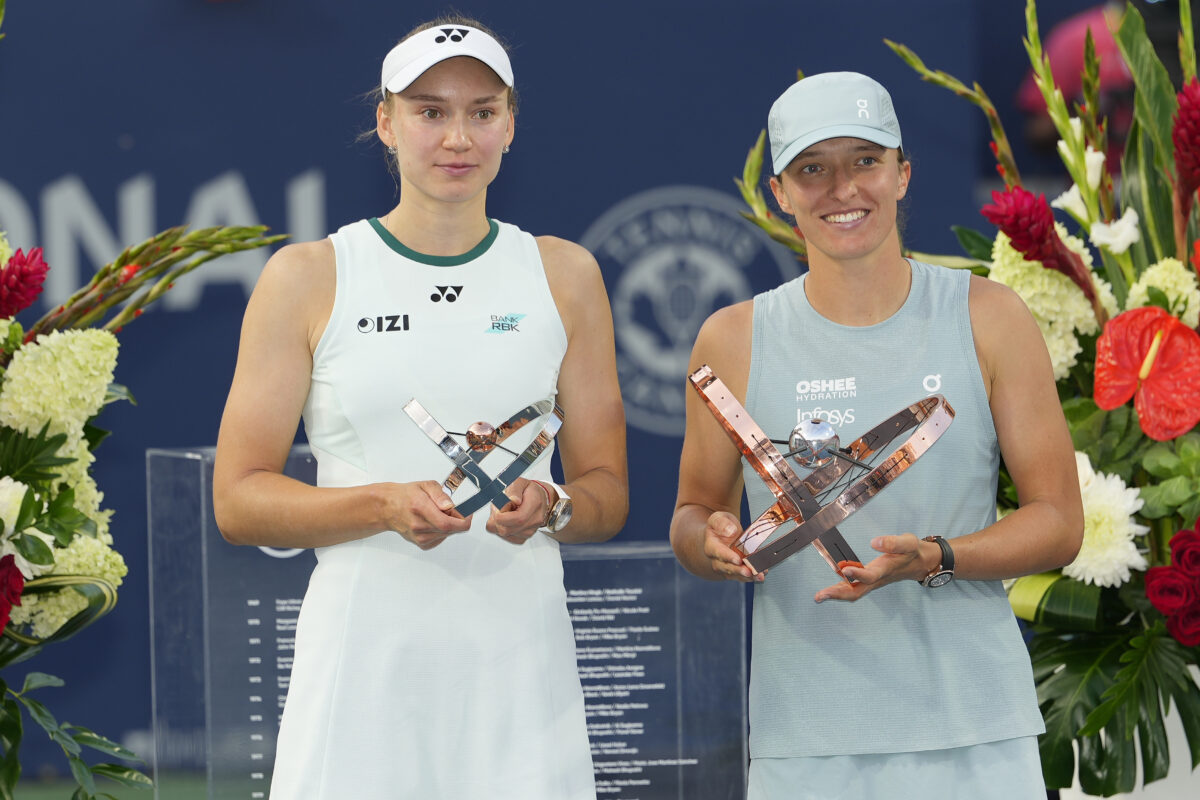 Aug 13, 2026; Toronto, Ontario, Canada; Iga Swiatek (POL) (right) poses with the the National Bank Open trophy with Elena Rybakina (KAZ) (left) after the National Bank Open final at Sobeys Stadium. Mandatory Credit: John E. Sokolowski-Imagn Images