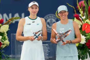 Aug 13, 2026; Toronto, Ontario, Canada; Iga Swiatek (POL) (right) poses with the the National Bank Open trophy with Elena Rybakina (KAZ) (left) after the National Bank Open final at Sobeys Stadium. Mandatory Credit: John E. Sokolowski-Imagn Images