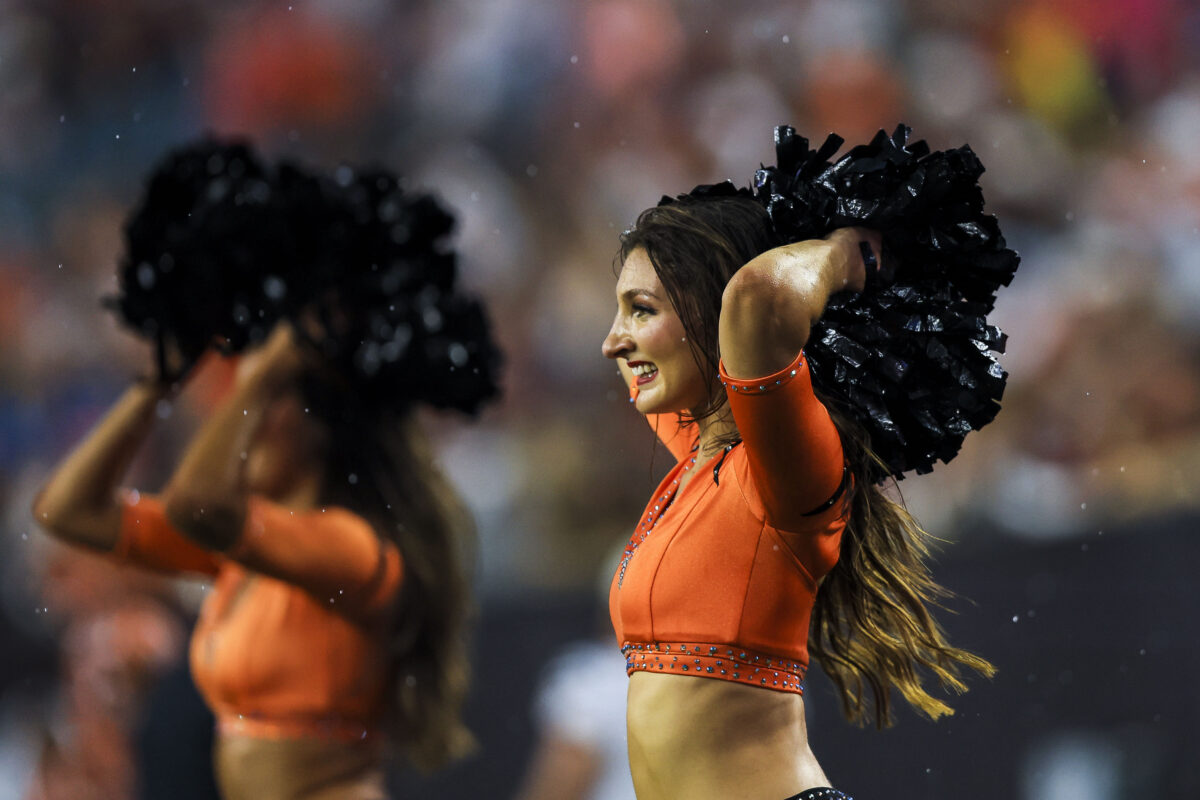 Aug 13, 2026; Cincinnati, Ohio, USA; A Cincinnati Bengals cheerleader cheers during the first half against the Detroit Lions at Paycor Stadium. Mandatory Credit: Katie Stratman-Imagn Images