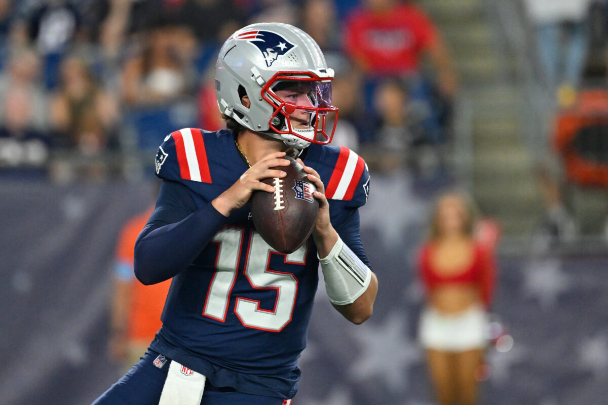 Aug 13, 2026; Foxborough, Massachusetts, USA; New England Patriots quarterback Behren Morton (15) looks for a receiver during the second half against the Indianapolis Colts at Gillette Stadium. Mandatory Credit: Eric Canha-Imagn Images