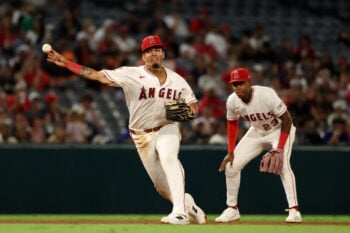 Aug 13, 2026; Anaheim, California, USA;  Los Angeles Angels third baseman Vaughn Grissom (5) throws a ball to first during the fifth inning against the Texas Rangers at Angel Stadium. Mandatory Credit: Kiyoshi Mio-Imagn Images
