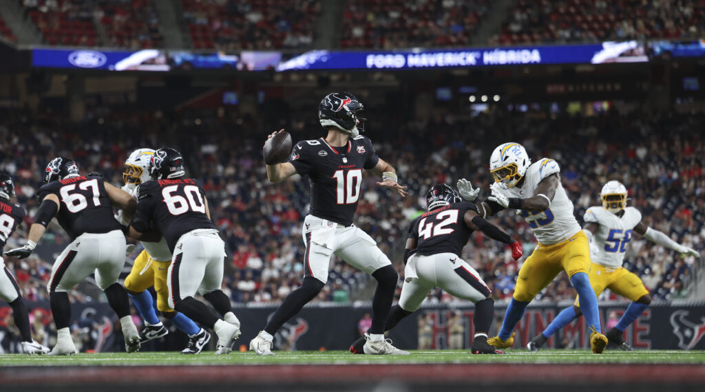 Aug 13, 2026; Houston, Texas, USA;  Houston Texans quarterback Davis Mills (10) attempts a pass during the game against the Los Angeles Chargers at Reliant Stadium. Mandatory Credit: Troy Taormina-Imagn Images