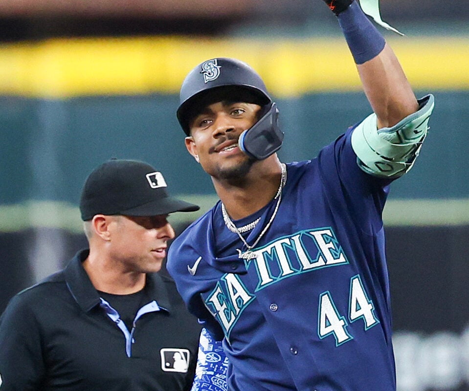 Aug 14, 2026; Houston, Texas, USA; Seattle Mariners designated hitter Julio Rodriguez (44) reacts to his RBI double against the Houston Astros in the first inning at Daikin Park. Mandatory Credit: Thomas Shea-Imagn Images