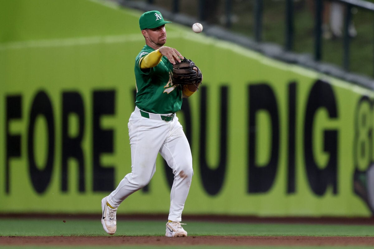 Aug 14, 2026; West Sacramento, California, USA; Athletics second baseman Donovan Walton (29) throws to first base for an out against the Texas Rangers during the seventh inning at Sutter Health Park. Mandatory Credit: Dennis Lee-Imagn Images