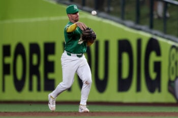Aug 14, 2026; West Sacramento, California, USA; Athletics second baseman Donovan Walton (29) throws to first base for an out against the Texas Rangers during the seventh inning at Sutter Health Park. Mandatory Credit: Dennis Lee-Imagn Images