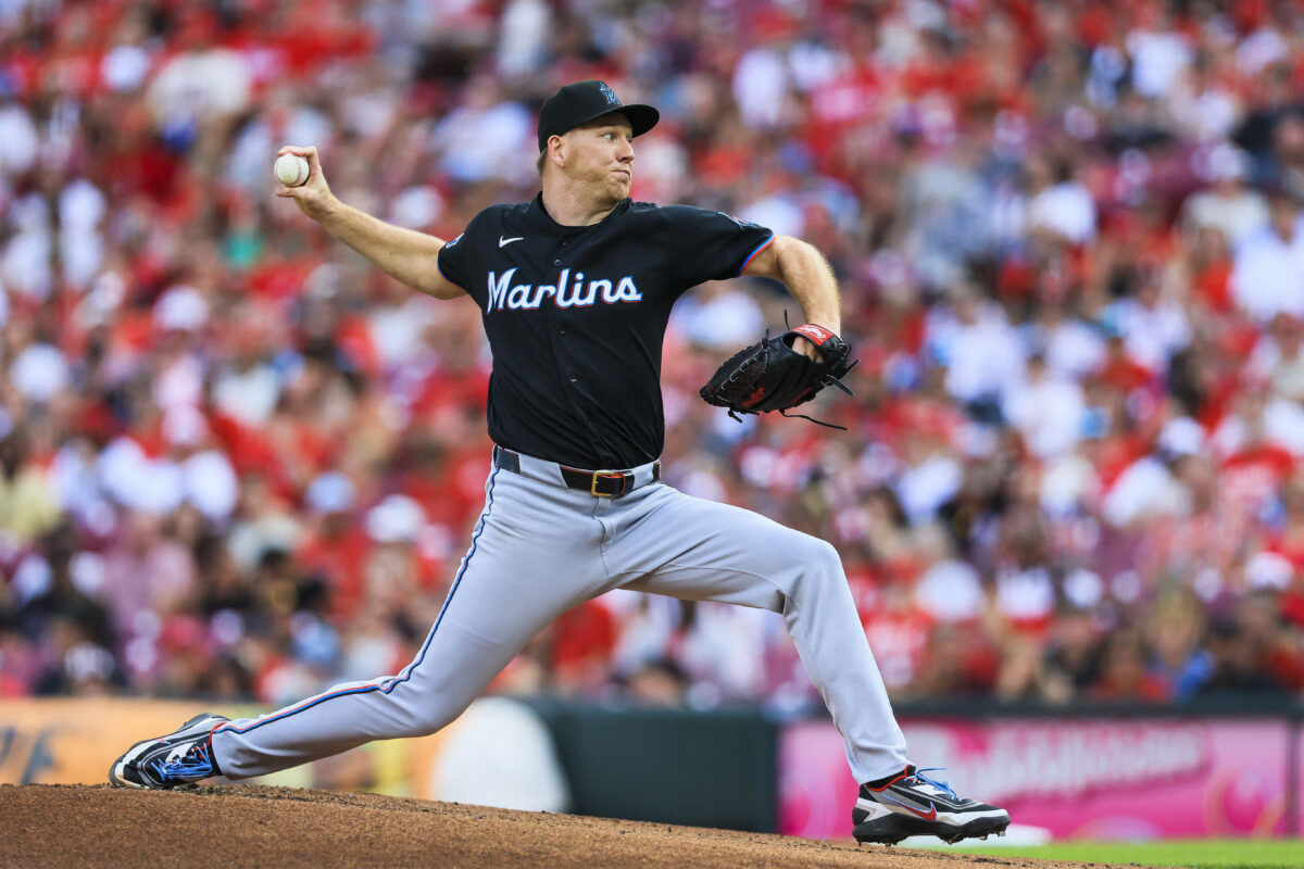 Aug 15, 2026; Cincinnati, Ohio, USA; Miami Marlins starting pitcher Ryan Gusto (65) pitches against the Cincinnati Reds in the first inning at Great American Ball Park. Mandatory Credit: Katie Stratman-Imagn Images