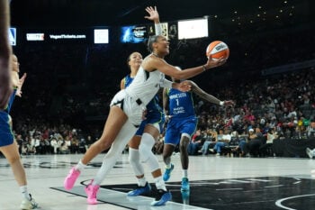Aug 15, 2026; Las Vegas, Nevada, USA; Las Vegas Aces center A'ja Wilson (22) collides with Minnesota Lynx forward Napheesa Collier (24) in the third quarter at Michelob Ultra Arena. Mandatory Credit: Candice Ward-Imagn Images