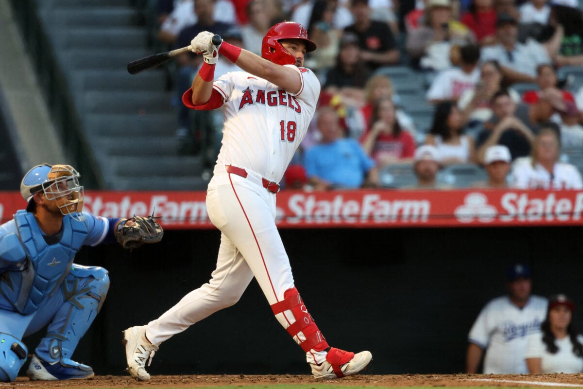 Aug 15, 2026; Anaheim, California, USA;  Los Angeles Angels first baseman Nolan Schanuel (18) hits a single during the third inning against the Kansas City Royals at Angel Stadium. Mandatory Credit: Kiyoshi Mio-Imagn Images