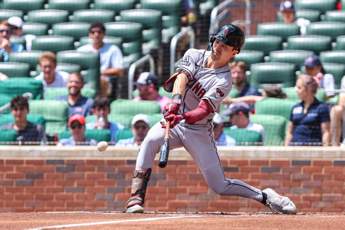 Aug 16, 2026; Cumberland, Georgia, USA; Arizona Diamondbacks right fielder Corbin Carroll (7) hits a single against the Atlanta Braves during the first inning at Truist Park. Mandatory Credit: Jordan Godfree-Imagn Images