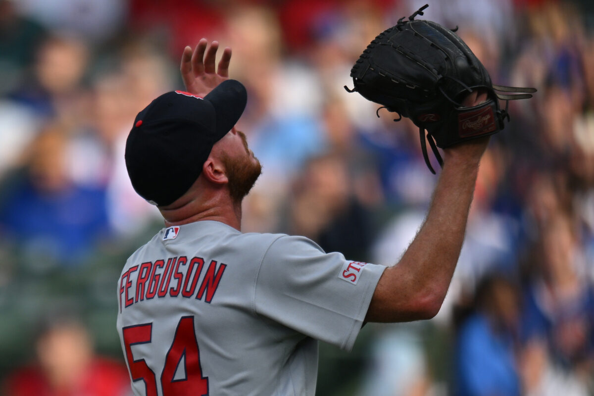 Aug 16, 2026; Chicago, Illinois, USA; St. Louis Cardinals pitcher Caleb Ferguson (54) celebrates after defeatinng the Chicago Cubs at Wrigley Field. Mandatory Credit: Patrick Gorski-Imagn Images