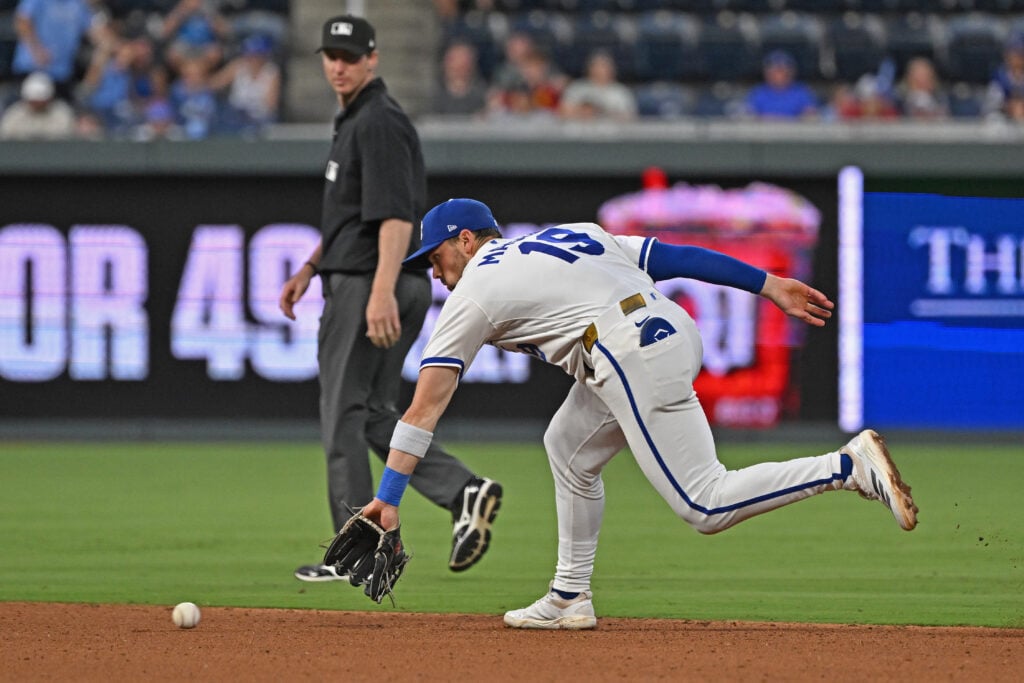 Aug 17, 2026; Kansas City, Missouri, USA; Kansas City Royals second baseman Michale Massey (19) fields a ground ball in the fourth inning against the Athletics at Kauffman Stadium. Mandatory Credit: Peter Aiken-Imagn Images