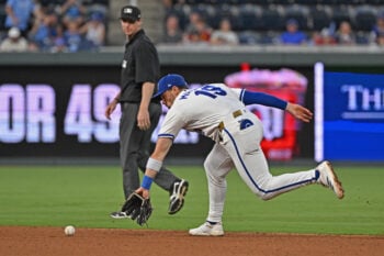 Aug 17, 2026; Kansas City, Missouri, USA;  Kansas City Royals second baseman Michale Massey (19) fields a ground ball in the fourth inning against the Athletics at Kauffman Stadium. Mandatory Credit: Peter Aiken-Imagn Images