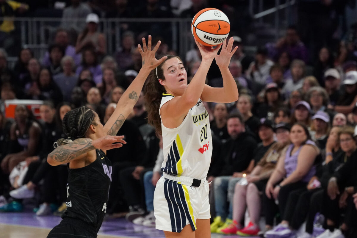 Aug 17, 2026; San Francisco, California, USA;  Dallas Wings forward Maddy Siegrist (20) shoots while defended by Golden State Valkyries forward Gabby Williams (1) in the fourth quarter at Chase Center. Mandatory Credit: David Gonzales-Imagn Images