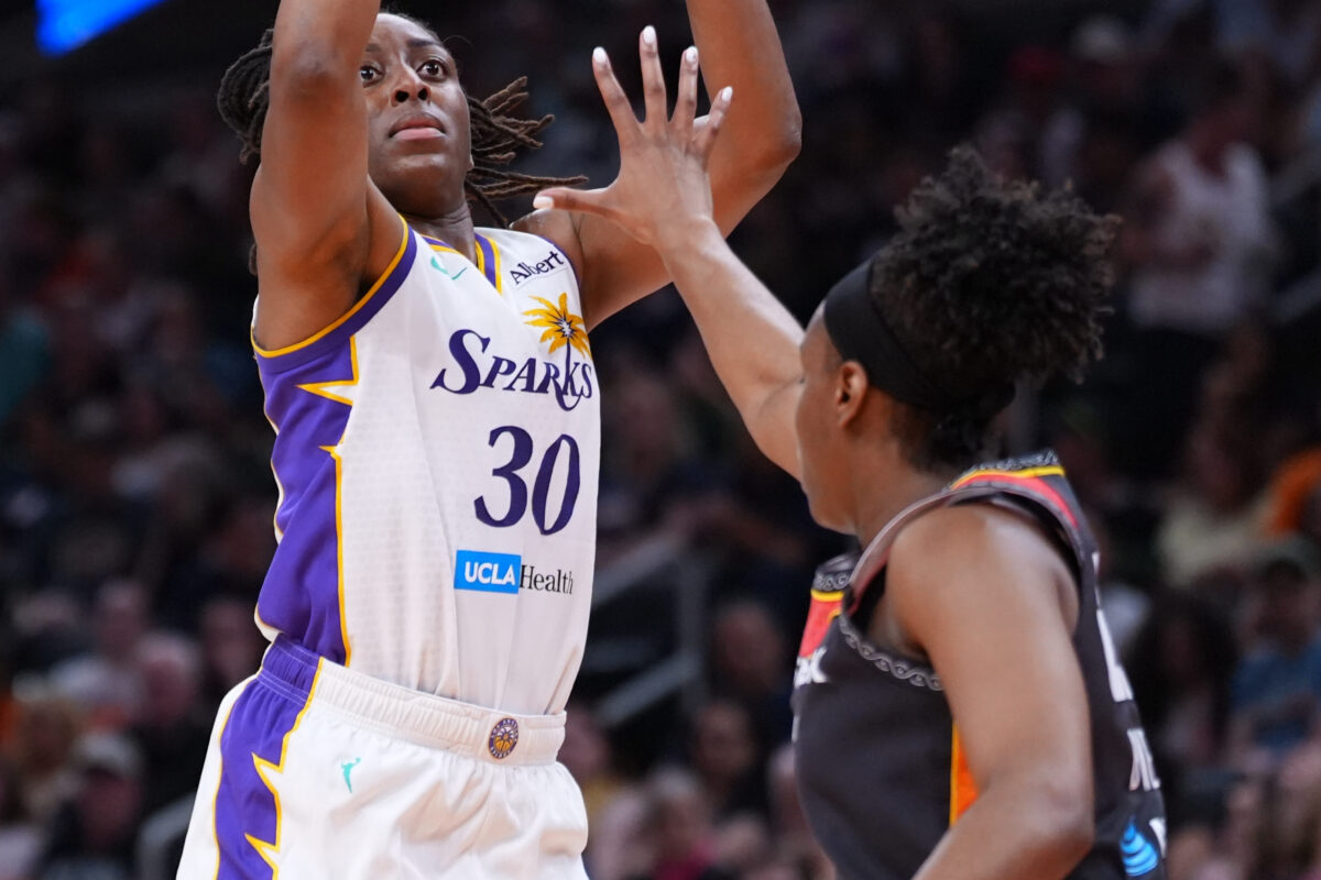 Aug 18, 2026; Boston, Massachusetts, USA; Los Angeles Sparks forward Nneka Ogwumike (30) shoots the ball against Connecticut Sun guard Kennedy Burke (25) in the second half at TD Garden. Mandatory Credit: David Butler II-Imagn Images