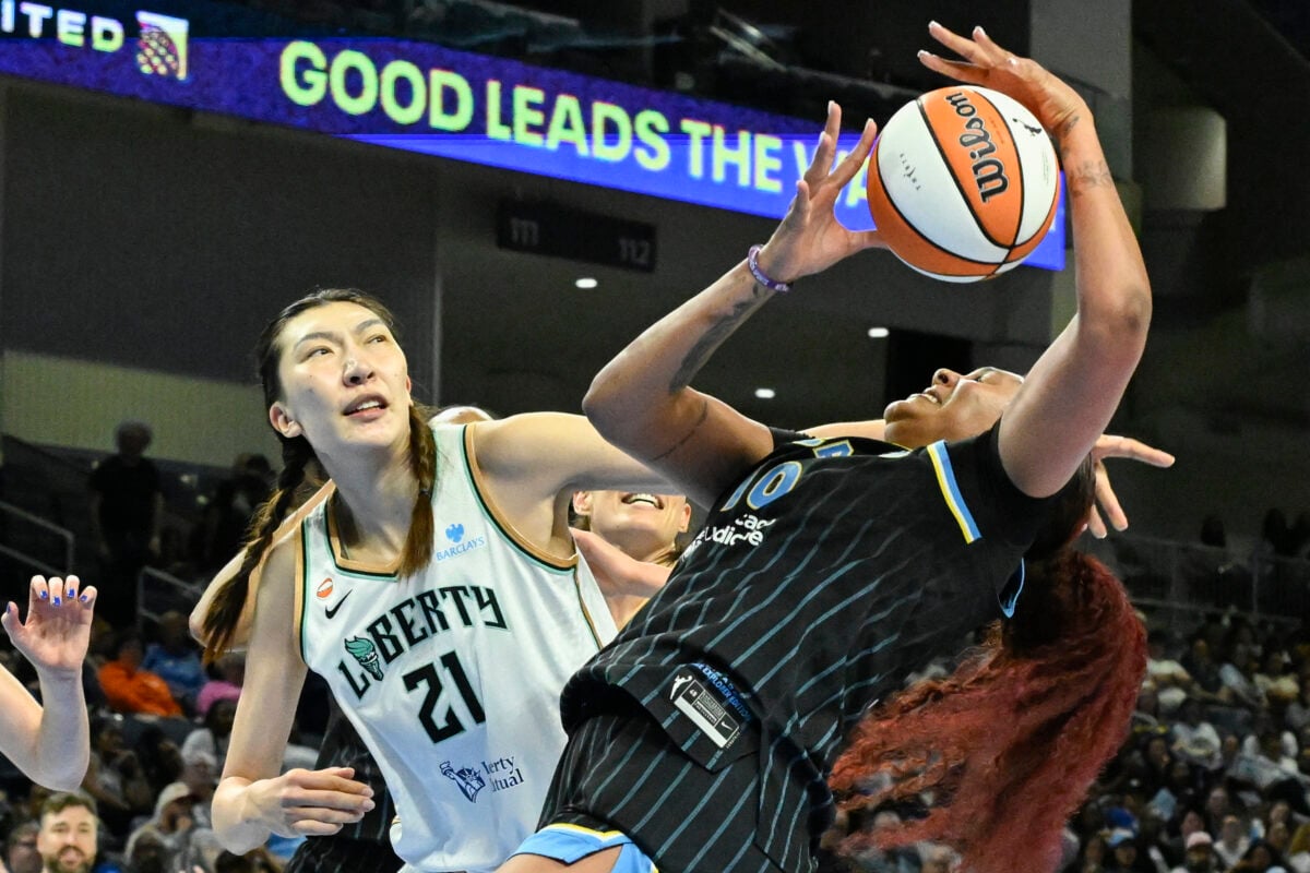 Aug 18, 2026; Chicago, Illinois, USA;  Chicago Sky center Kamilla Cardoso (10) rebounds against New York Liberty center Han Xu (21)  during the second half at Wintrust Arena. Mandatory Credit: Matt Marton-Imagn Images