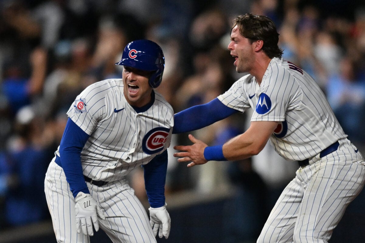 Aug 18, 2026; Chicago, Illinois, USA; Chicago Cubs third baseman Alex Bregman (3) celerates with shortstop Nico Hoerner (2) after hitting a walk-off RBI single against the Chicago White Sox during the ninth inning at Wrigley Field. Mandatory Credit: Patrick Gorski-Imagn Images