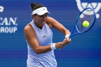 Aug 19, 2026; Mason, OH, USA;  Jessica Pegula (USA) returns a shot against Sorana Cirstea (ROU) during the Cincinnati Open at Lindner Family Tennis Center. Mandatory Credit: Aaron Doster-Imagn Images